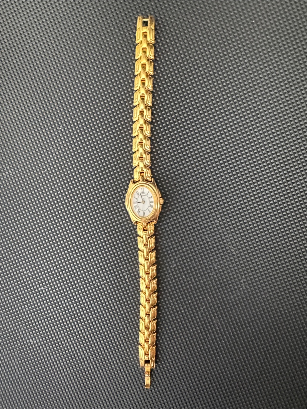Seiko Gold-Tone Linked Bracelet Women's Watch with Oval Silver Dial